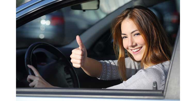 picture of a woman , a woman sitting in a car 
