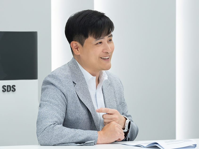 삼성SDS 클라우드 연구와 AI 인프라 전략을 설명하는 장민성 연구팀장 인터뷰 모습
